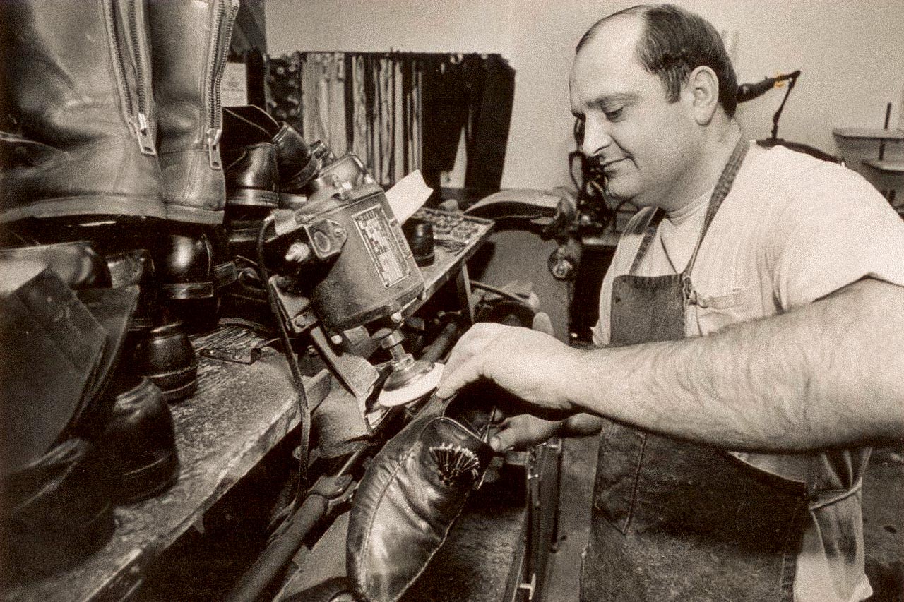 John Vlagos - Master Cobbler and Father of George Vlagos proudly working at his shoe repair in the early 1980s